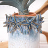 Sea the Stars Container